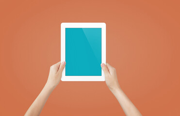 Female hands holding tablet with blank screen isolated