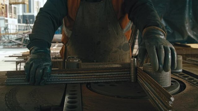 Preparation of concrete rebar links. Steel rods in shape
