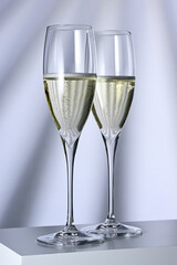 Two glasses with champagne close up - 790176824