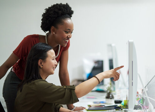 Internship, women and computer at desk for opinion, mentorship and female consultant in office for project. Coaching, feedback and support from colleague in workplace for global start up company