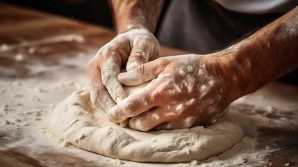 Foto auf Leinwand Close-up of a baker's hands scoring dough for artisan breads, showcasing the skill and care in the baking process.  © Thanthara