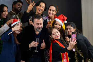 Business people taking selfie - Business party and success celebration.  Group of diverse business people colleagues or employees together drinking champagne at event party. achievement