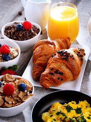 Breakfast served with coffee, juice, croissants and fruits