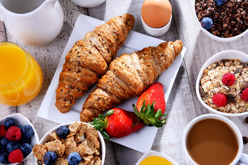 Breakfast served with coffee, juice, croissants and fruits - 790186805
