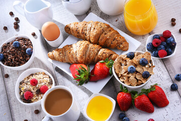 Breakfast served with coffee, juice, croissants and fruits - 790186830
