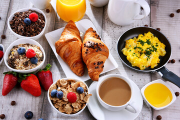 Breakfast served with coffee, juice, croissants and fruits - 790187063