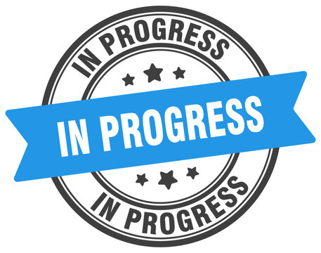 in progress stamp. in progress label on transparent background. round sign