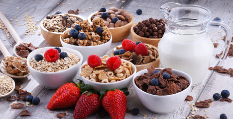 Bowls with different sorts of breakfast cereal products - 790193004