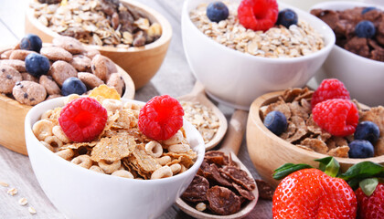 Bowls with different sorts of breakfast cereal products