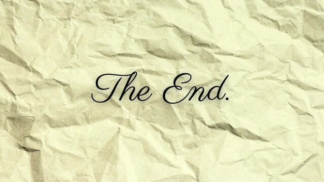 Animated one line phrase "The End" written by hand, isolated on a crumpled white piece of paper.
