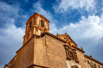 Facade and tower of the church of the Colegio de Diocesano de Santo Domingo Orihuela, Alicante, Valencian Community, Spain