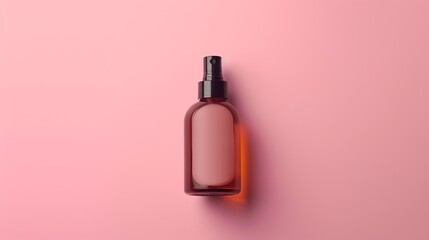 Brown Spray Bottle on Pink Background