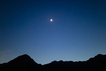 night in the mountains. contrast photo alpine mountains. night sky in the stars. outdoor recreation...