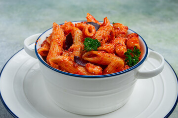 Penne pasta, with shrimp in tomato sauce, close-up, no people,