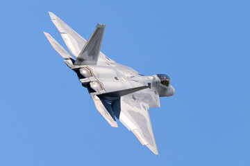 Very close tail  view of a F-22 Raptor in beautiful light