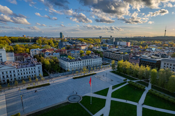 Aerial green spring sunset view of Lukiškės square, Vilnius downtown, Lithuania - obrazy, fototapety, plakaty