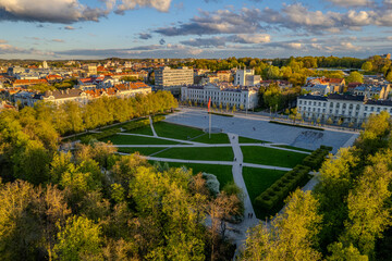Aerial green spring sunset view of Lukiškės square, Vilnius downtown, Lithuania