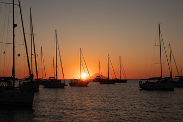 Silhouetted Yachts at anchor in the bay of Vulcano, one of the Aeolian Islands