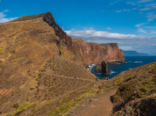 Cape Ponta de Sao Lourenco, Canical, East coast of Madeira Island, Portugal. Scenic volcanic landscape of Atlantic Ocean, rocks and cllifs and cloudy sunrise sky. Views from popular hiking trail PR8 - 790260488