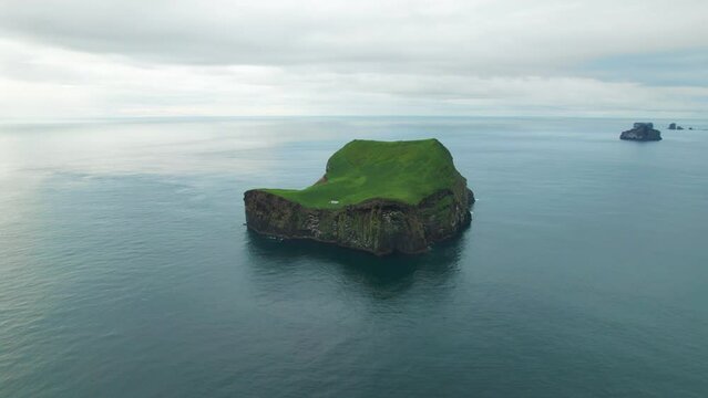 Westman Islands Iceland Drone Circles Lonely House On Remote Island In Middle of Ocean. Incredible Landscape Remote Nomadic Living.