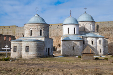 Two ancient temples in the Ivangorod fortress on a sunny March day. Leningrad region, Russia