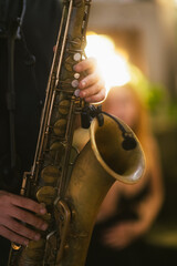 Captured in the midst of a concert, the essence of a saxophone's allure is framed in close-up - 790274412