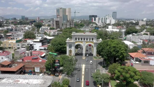 Aerial image over one of the main streets in Guadalajara Mexico, this is the famous Vallarta Avenue, on this avenue are the arches and the minerva iconic monuments of this city, 