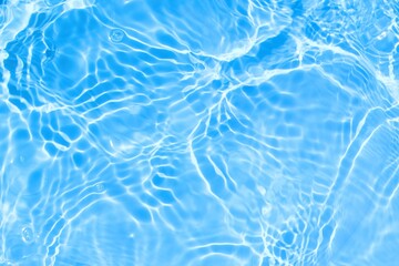 clean water texture top view background with shiny calm and transparent ripples for summer design ....