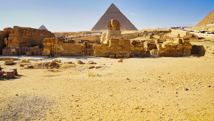 Magnificent wide landscape view of the Great Sphinx of Giza with the Pyramid of Khafre in the...