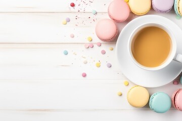 Obraz na płótnie Canvas Artistic flat lay of pastel macarons, art supplies, and coffee, styled on a light wood surface, perfect for a cozy, creative break theme
