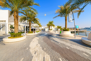 Seaside cafes and shops along the waterfront promenade at the Yas Waterfront district on Yas Island in Abud Dhabi, United Arab Emirates. © Kirk Fisher
