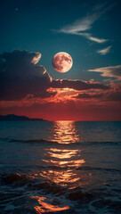 Beautiful and dramatic red sky with a full moon over the the ocean