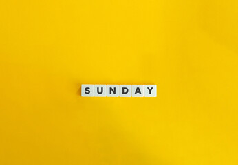 Sunday Word. Text on block letters on bright orange background. Minimal aesthetics.