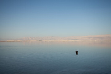 Obraz na płótnie Canvas Evening landscape of the Dead Sea shore
