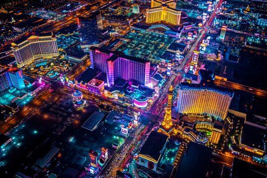 This photo captures the illuminated Las Vegas Strip from above, showcasing the bustling nightlife and iconic landmarks, Bright lights of Las Vegas Strip from above, AI Generated