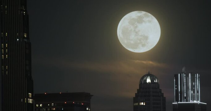 Full Moon in Sky Over New York City Buildings