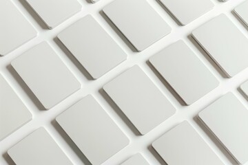 blank playing cards in rows on a white table, mockup, cards, photograph, magazine --ar 3:2 Job ID: 33350b52-c053-468a-8f18-cc55801b4d1d