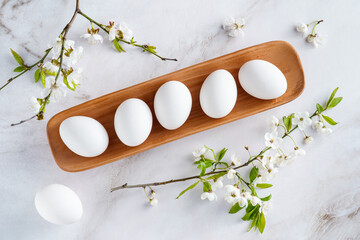 Concept of spring, eggs with flowers, top view. These Are easter themed images. High quality photo