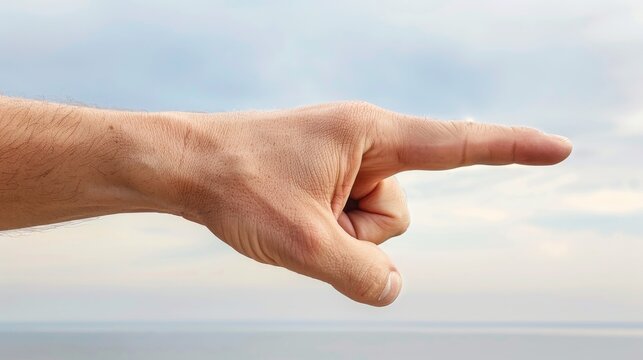 A man pointing his finger at the camera with a cloudy sky in background, AI