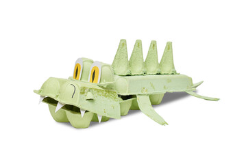 Creative crocodile from egg carton, crafts on a transparent background