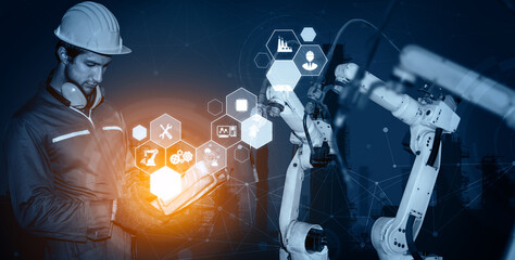 MLB Smart industry robot arms for digital factory production technology showing automation manufacturing process of the Industry 4.0 or 4th industrial revolution and IOT software to control operation.