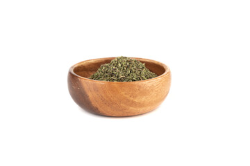 Dried thyme herb in wooden bowl on white background.
