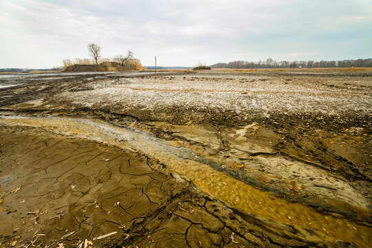 Dried bottom of a lake with mud