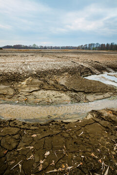 Dried bottom of a lake with mud