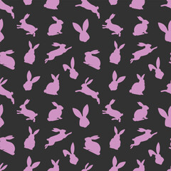Easter seamless pattern of pink rabbit silhouettes in different actions. Festive Easter bunnies design. Isolated on black background. For Easter decoration, wrapping paper, greeting, textile, print