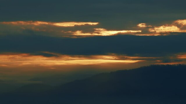 Sunrise Clouds With Mountains. The Sun Rises Above The Mountains. Sky Texture.