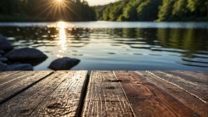 Sunset over a tranquil lake with a wooden pier and rocks