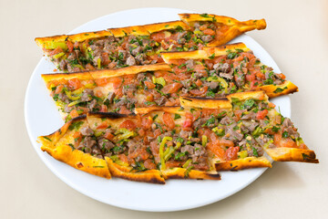 Kiymali pide. Turkish pide with minced meat. Turkish pizza mince pita Pide on white background. Etli ekmek. Kusbasi kasarli, kiymali kasarli, kiymali yumurtali, Bafra, Trabzon, Kusbasili pide.