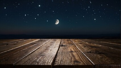 Wooden platform against a star lit night sky with moonlight