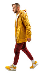 An Isolated standing handsome young man wearing a yellow raincoat and red trousers, cutout on transparent background, ready for architectural visualisation. png